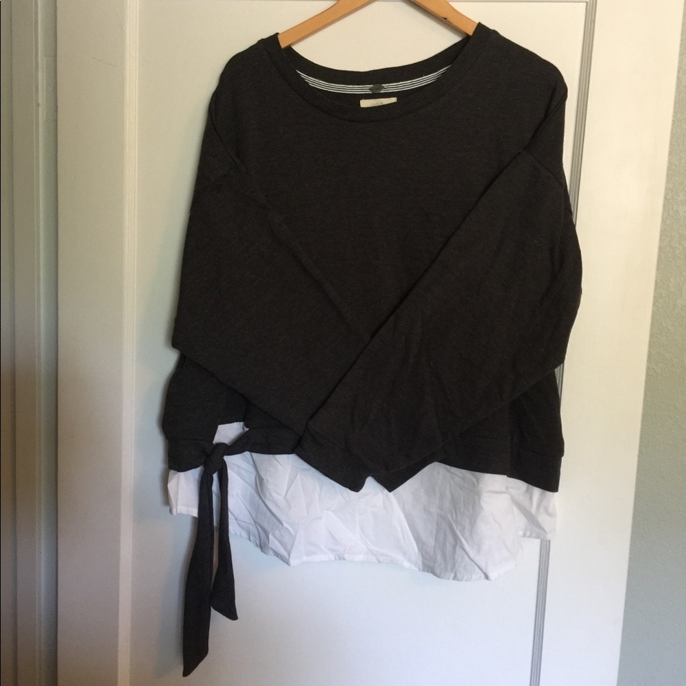 Grey sweatshirt with blouse detail at bottom